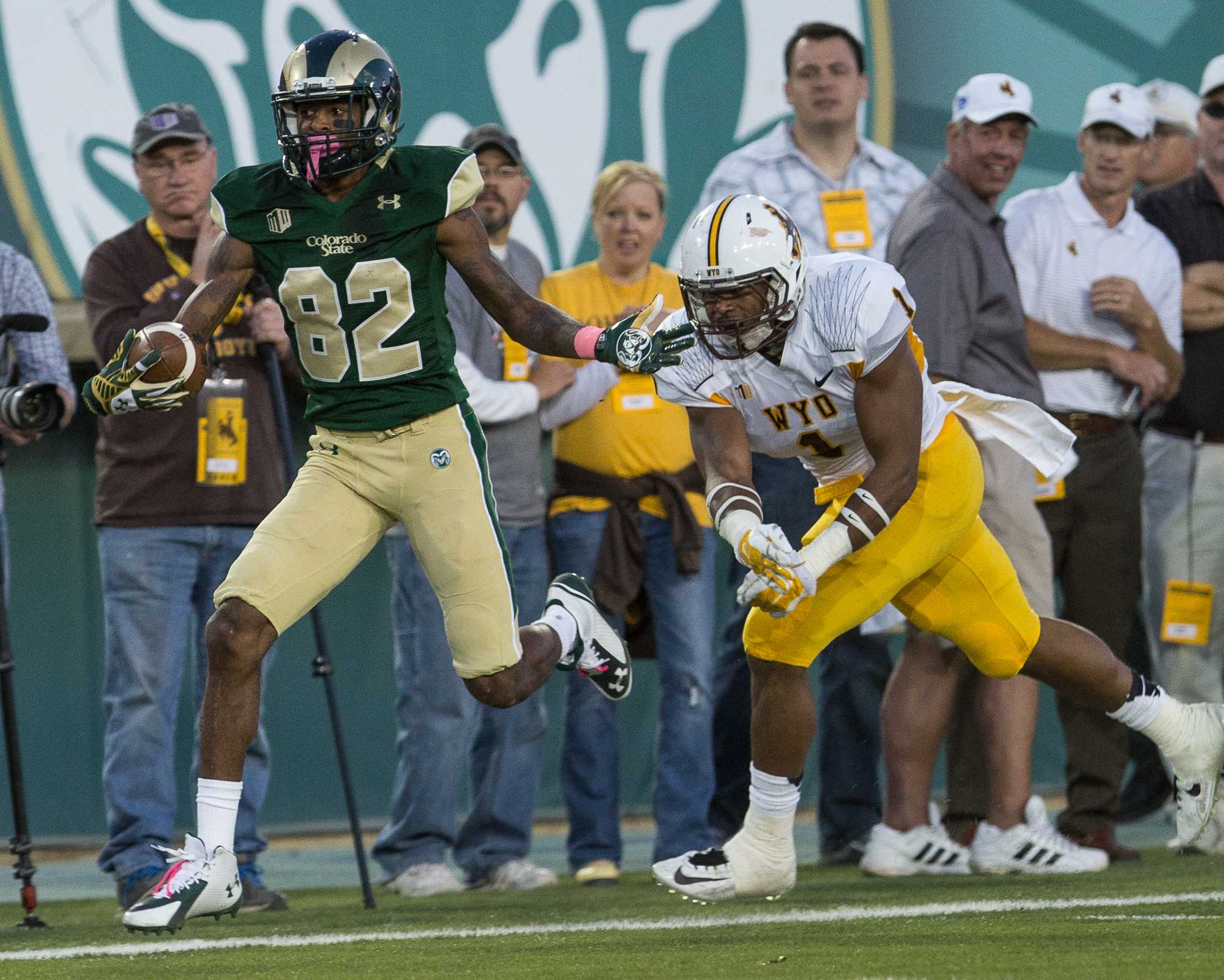 Colorado State wide receiver Rashard Higgins (82), breaks away from a Wyoming defender during the Rams' 45-31 victory over the Cowboys Saturday.